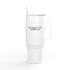 A tall white insulated travel tumbler with a handle, clear lid, and white straw. The front is printed with the black text 'MONACO'S coffee co.